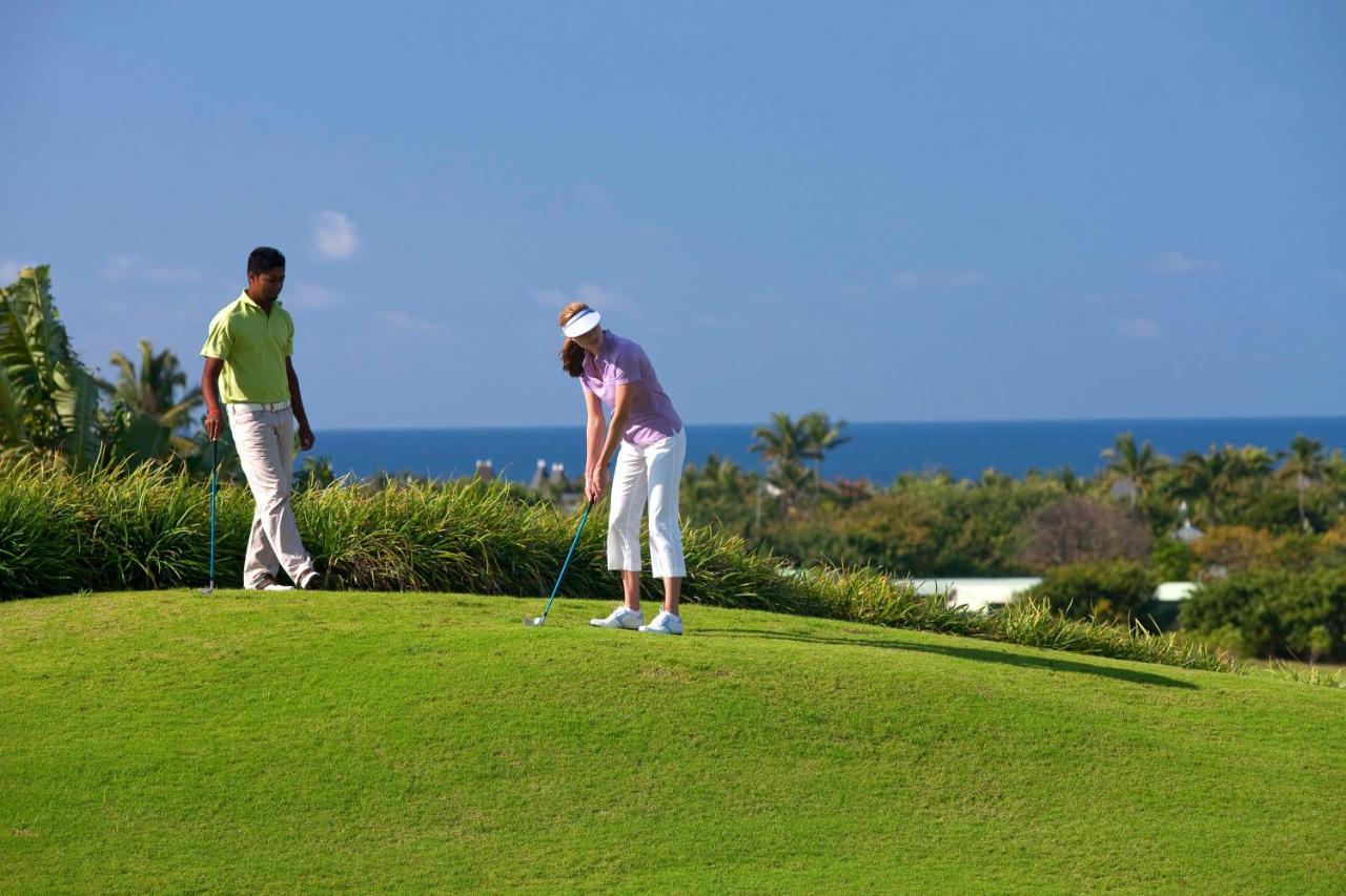传承太妃高尔夫及健康度假村 贝尔欧布莱 外观 照片 Golfers at the Four Seasons Resort